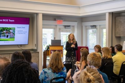 Karen Roberto, the director of ISCE, presenting.