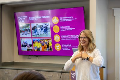 Amy Azano, the director of the Center for Rural Education presenting.