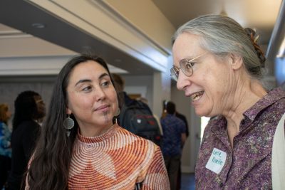 Carrie Kroehler and Cana Uluak Itchuaqiyaq conversate during the event.