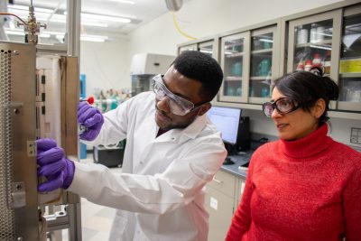 Two researchers working in a lab.