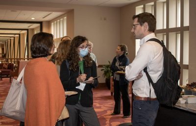 Participants mingle at a reception following the Whole Health Consortium kick off event in March 2023. Photo courtesy of Felicia Spencer. 